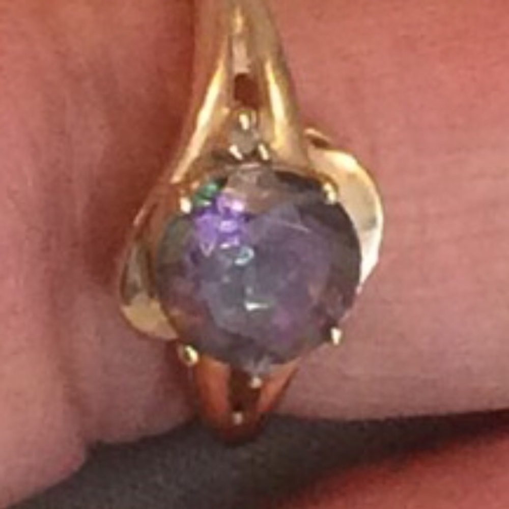 10k gold ring mystic topaz.